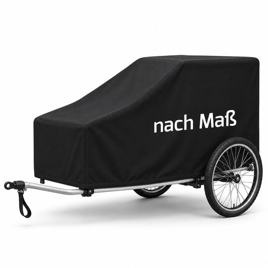 Schwarze Hundeanhänger Abdeckung nach Maß mit sichtbaren Speichenrädern und freiliegender Deichsel